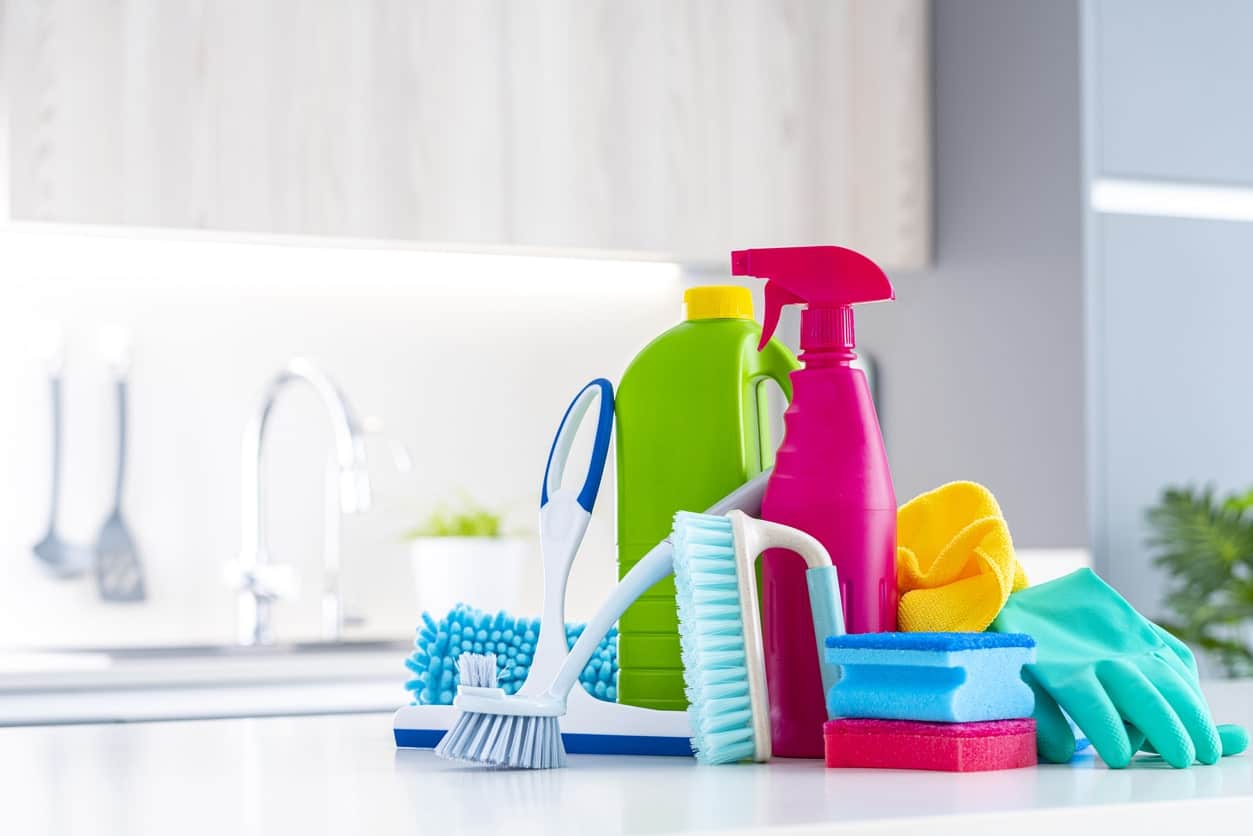 collection of cleaning supplies in professional setting